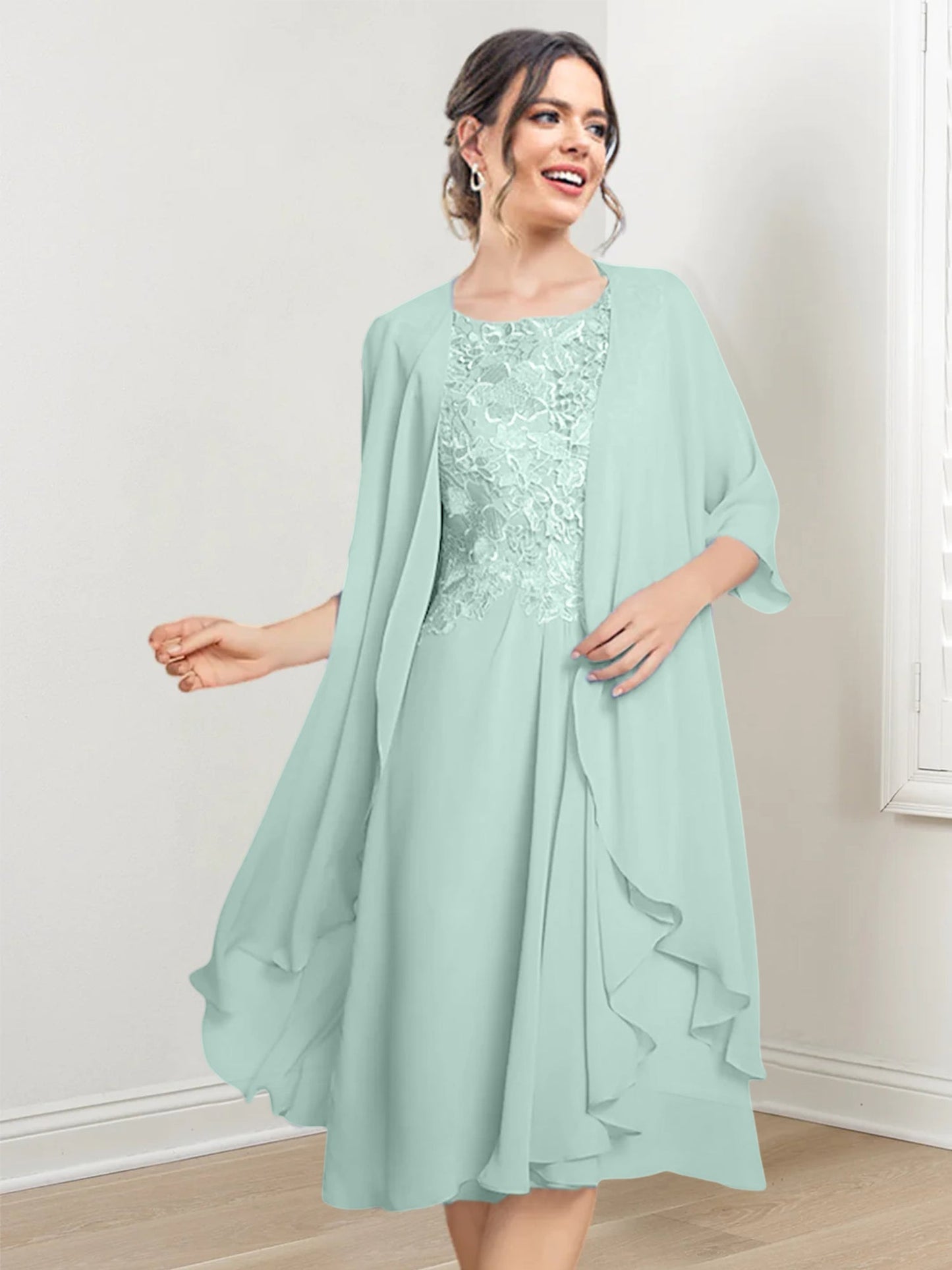 Vestidos de madre de la novia de corte A/princesa con escote redondo y largo hasta la rodilla