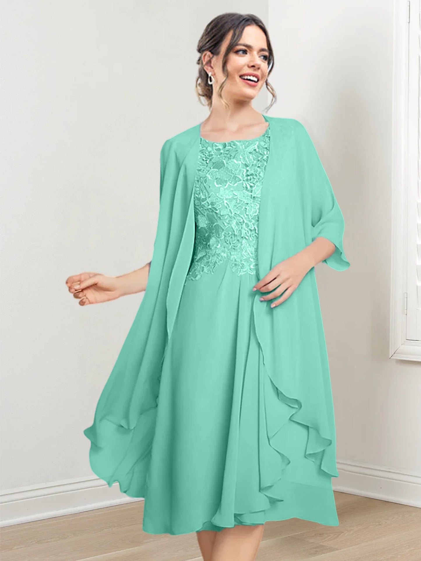 Vestidos de madre de la novia de corte A/princesa con escote redondo y largo hasta la rodilla