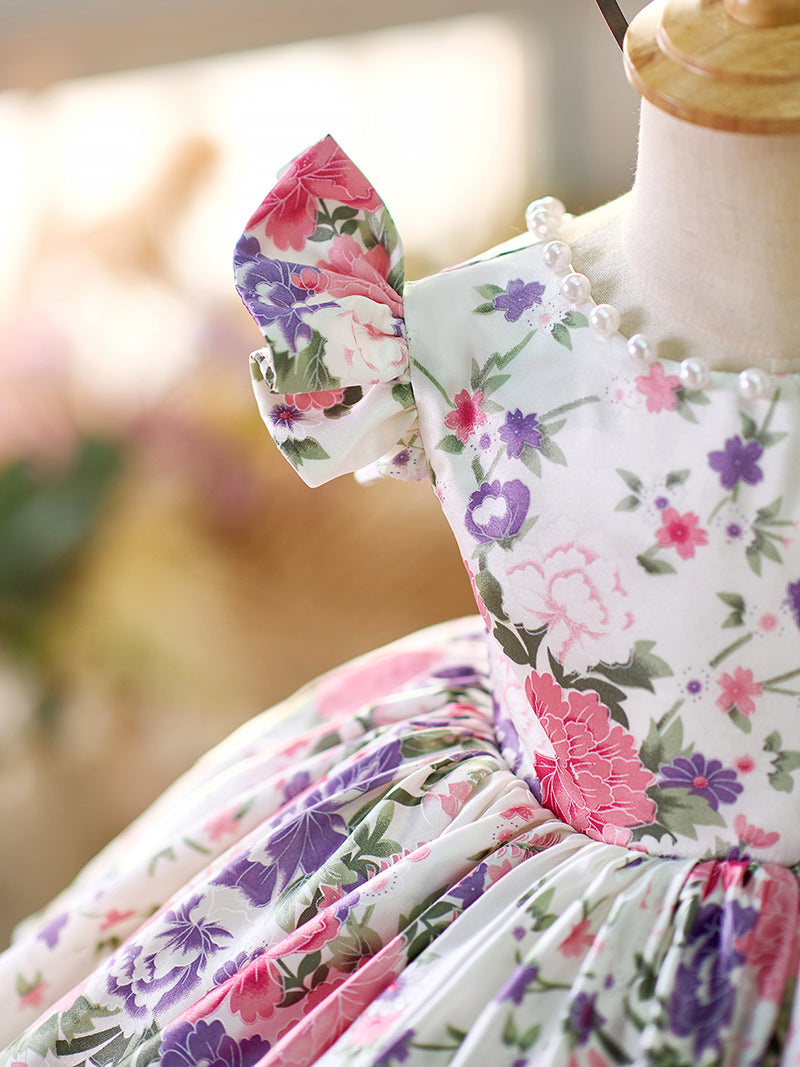 Vestido floral con mangas abullonadas hasta la rodilla para niña