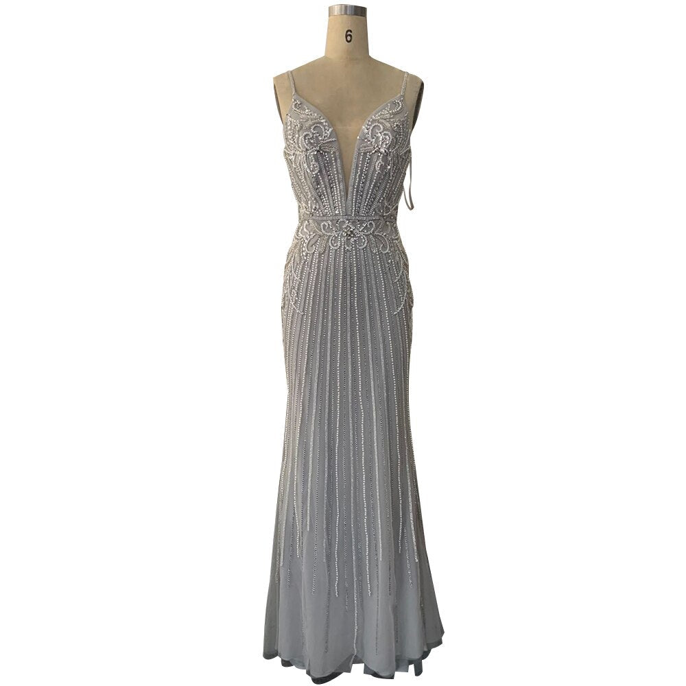 Dubai Champagner Ärmellose Meerjungfrau Sexy Abendkleider 2025 Perlen Pailletten Rückenfreies Abendkleid LA70400