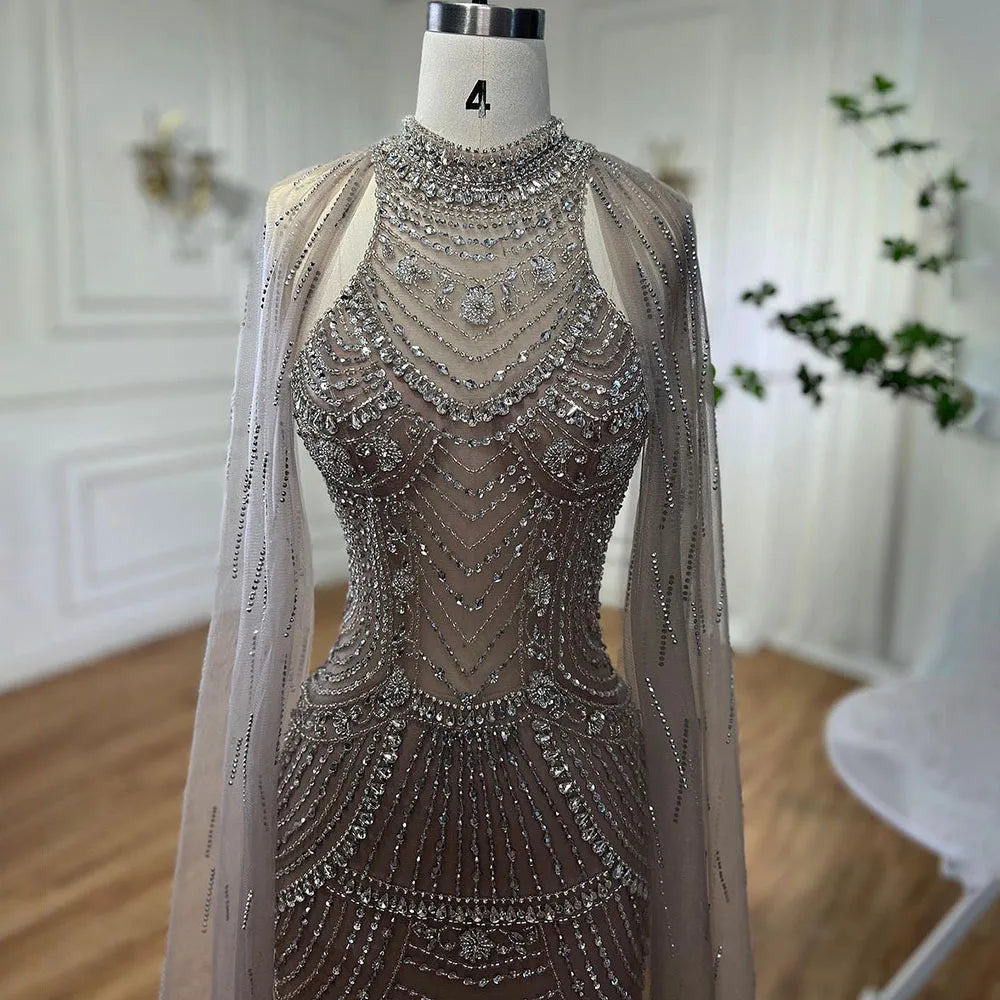 Luxuriöses Dubai Champagner Meerjungfrau Abendkleid mit Cape-Ärmeln LA72138