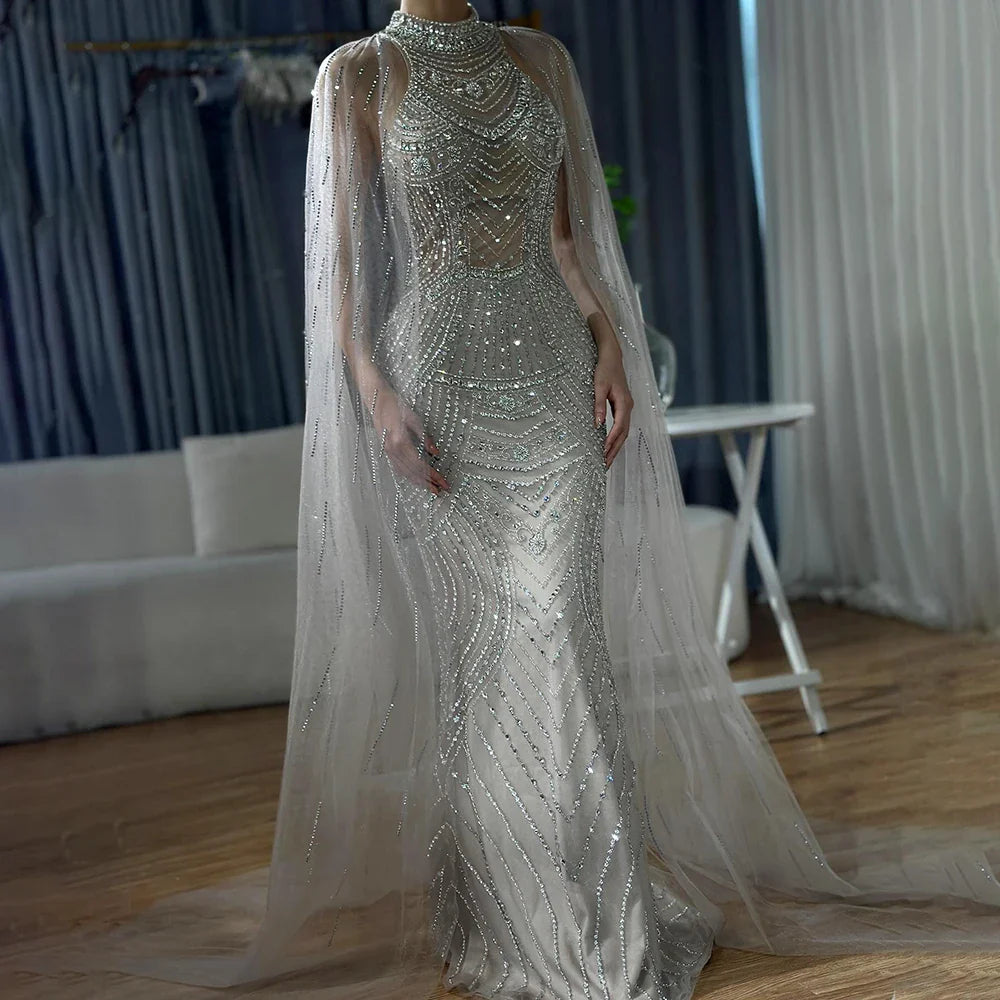 Luxuriöses Dubai Champagner Meerjungfrau Abendkleid mit Cape-Ärmeln LA72138