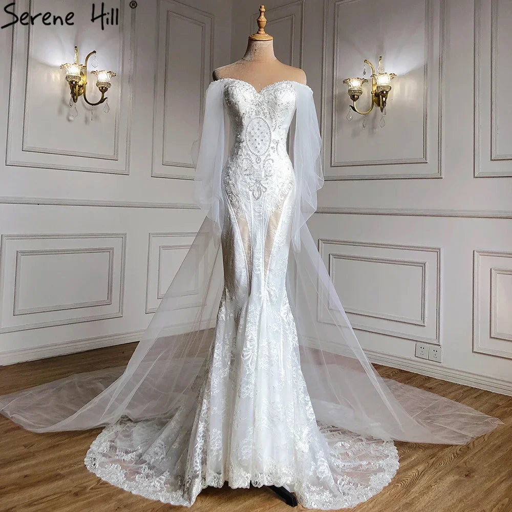 Vestidos de novia elegantes de sirena con encaje de cristal, hombros descubiertos y mangas farol, hechos a medida, estilo Dubái 2025, HA2402