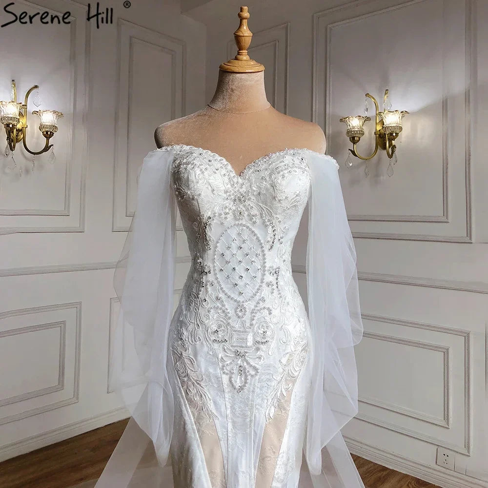 Vestidos de novia elegantes de sirena con encaje de cristal, hombros descubiertos y mangas farol, hechos a medida, estilo Dubái 2025, HA2402