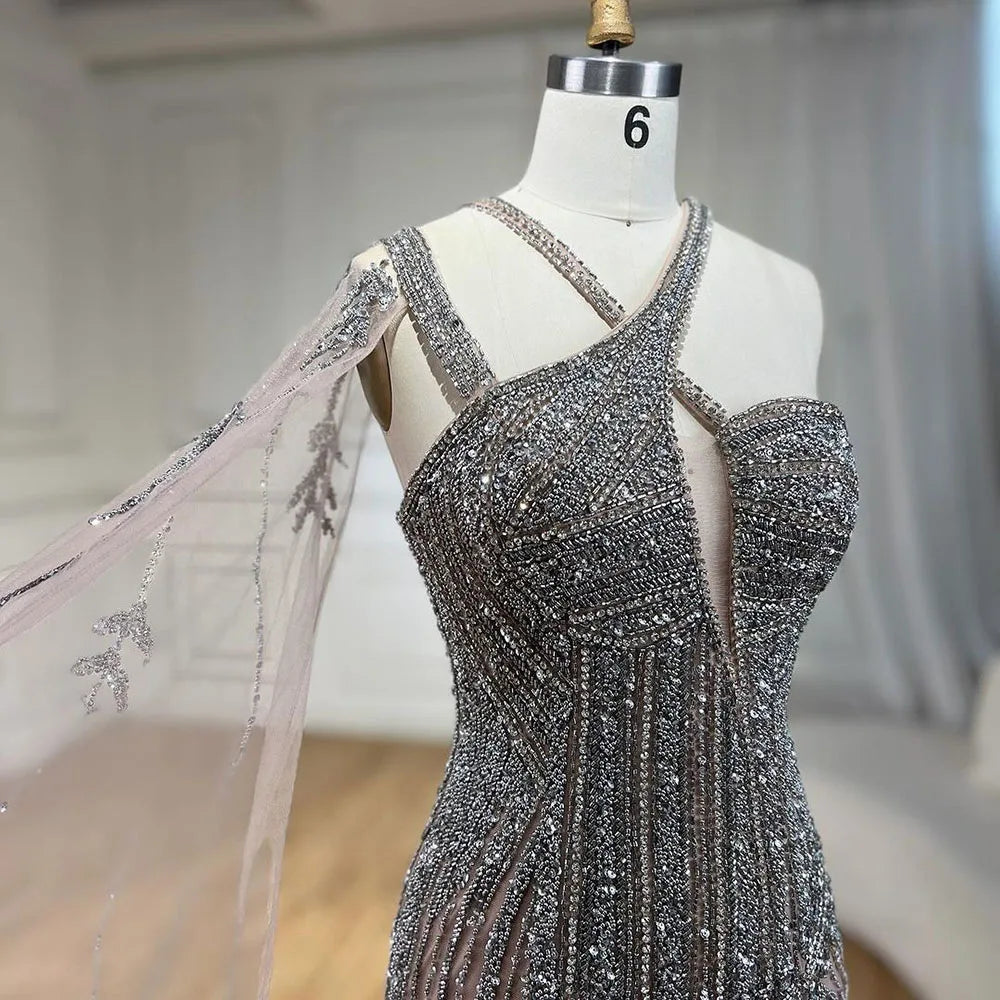 Vestido de noche estilo sirena, color gris nude, con un solo hombro, mangas estilo capa, abertura alta y cuentas, largo para mujer, fiesta LA72368