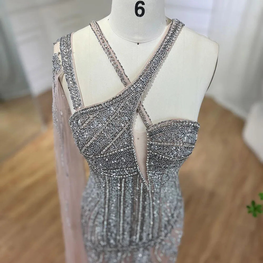 Vestido de noche estilo sirena, color gris nude, con un solo hombro, mangas estilo capa, abertura alta y cuentas, largo para mujer, fiesta LA72368