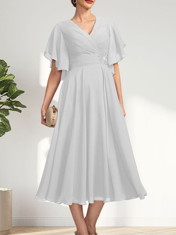 A-line V-Neck Tea-Length Chiffon Mother of the Bride Dress With Pleated Beading