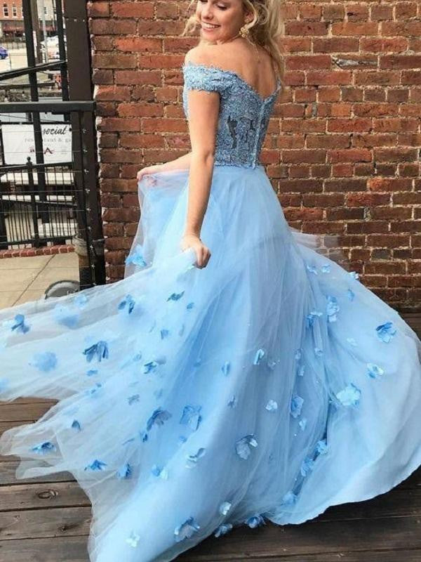 Elegante vestido de fiesta de tul con hombros descubiertos, apliques, sin mangas y largo hasta el suelo.