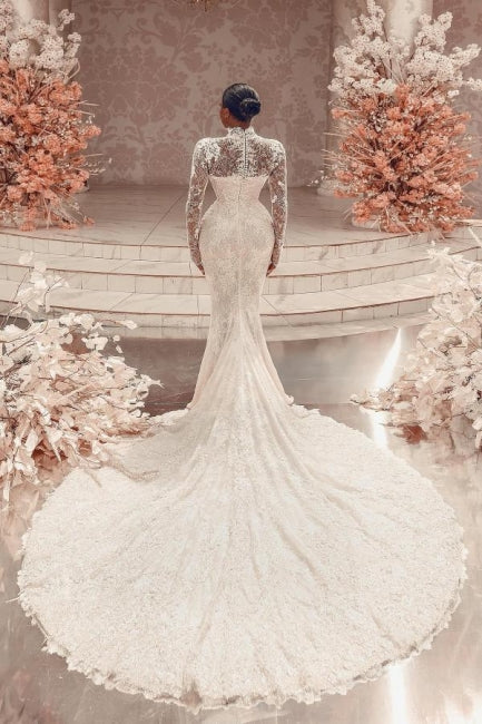 Increíble vestido de novia largo blanco de manga larga con cuello alto y encaje de columna y apliques en la cola