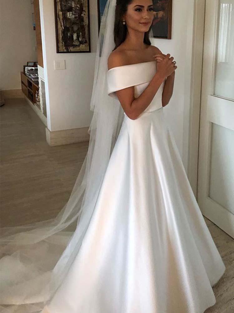 Impresionantes vestidos de novia largos de satén con corte A y hombros descubiertos y botones cubiertos