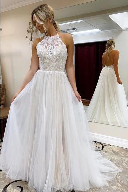 Vestido de novia largo playero de corte A con escote halter de tul y encaje, sin espalda