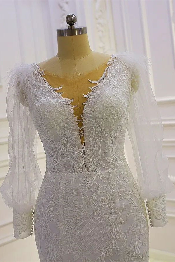 Wunderschönes Meerjungfrau-Brautkleid mit langen Ärmeln und Spitzenapplikationen und Schleppe