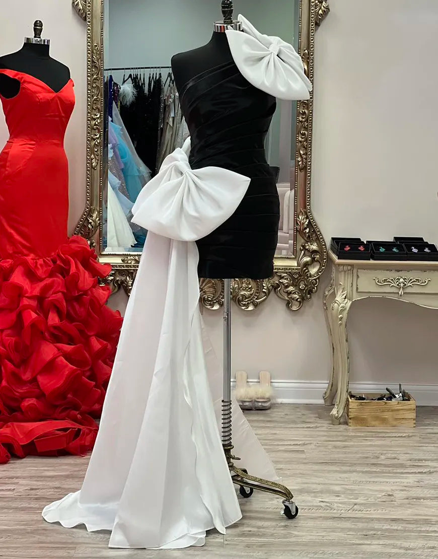 Vestido de fiesta negro ajustado de un solo hombro con lazos blancos