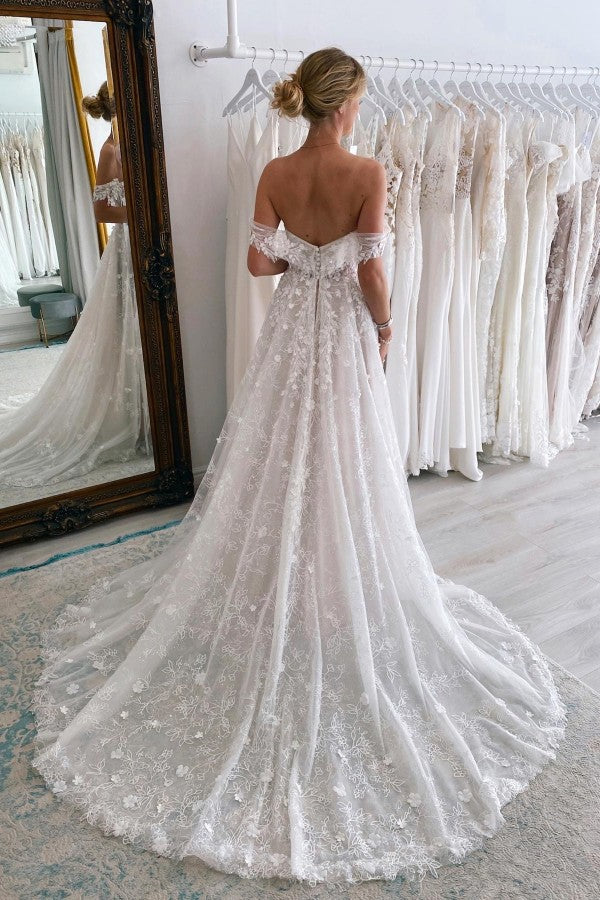 Vestido de novia encantador, largo, sin mangas, con encaje y corte en A, hombros descubiertos y cola de corte.