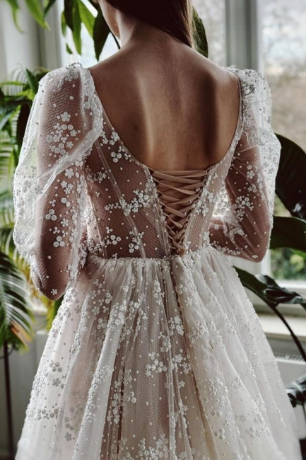 Vestido de novia encantador de encaje, largo, color marfil, corte A, mangas largas y abertura