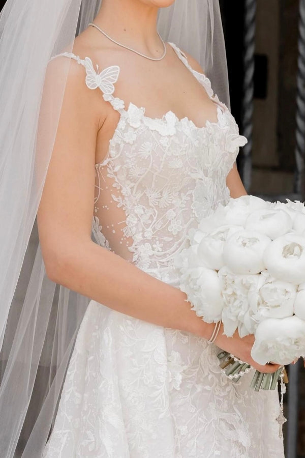 Encantador vestido de novia largo color marfil sin mangas de encaje con cola desmontable