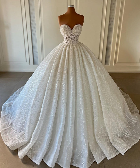 Vestido de novia encantador con escote corazón, sin mangas, lentejuelas y sin tirantes