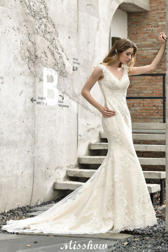 Vestido de novia de sirena con escote en V y encaje floral, sin mangas