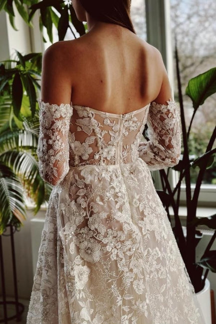 Schickes langes A-Linien-Brautkleid mit schulterfreier Spitze und Perlenbesatz und langen Ärmeln