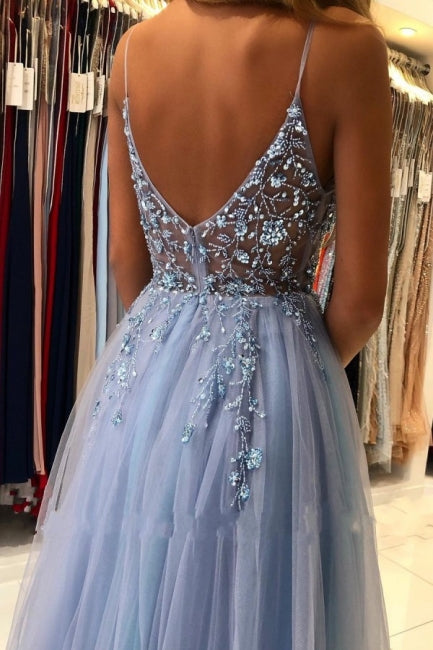 Elegantes vestidos de noche largos azules con cuentas y aberturas