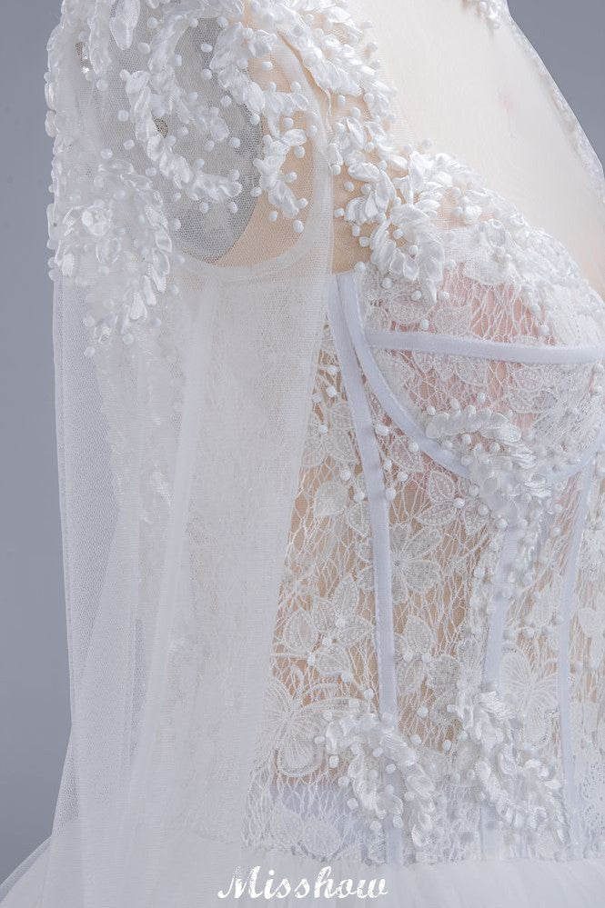 Elegante vestido de novia de tul con encaje, cuello alto, mangas largas y largo hasta el suelo