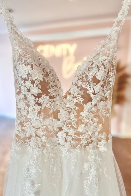 Glamorosos vestidos de novia de encaje, corte A, sin mangas y con escote en V