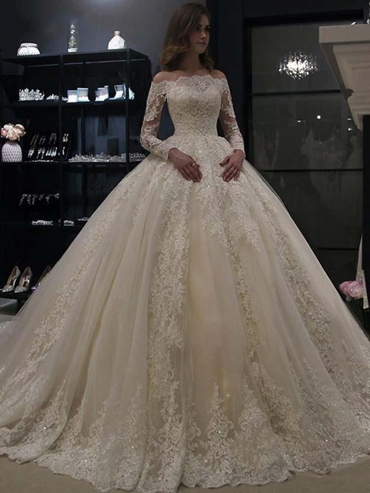 Hermosos vestidos de novia de tul con encaje y mangas largas