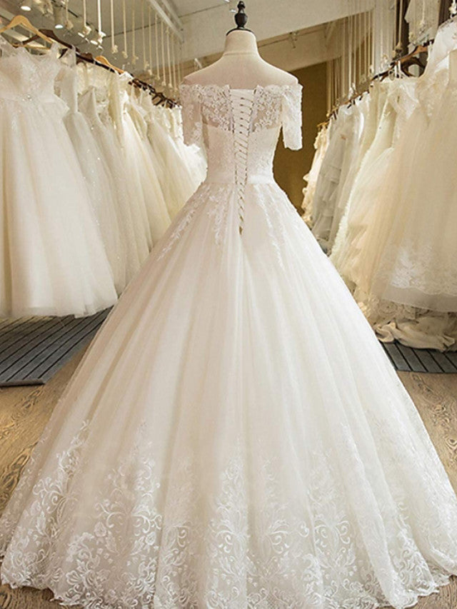 Vestido de novia largo de tul con encaje, cola de corte A y hombros descubiertos con mangas