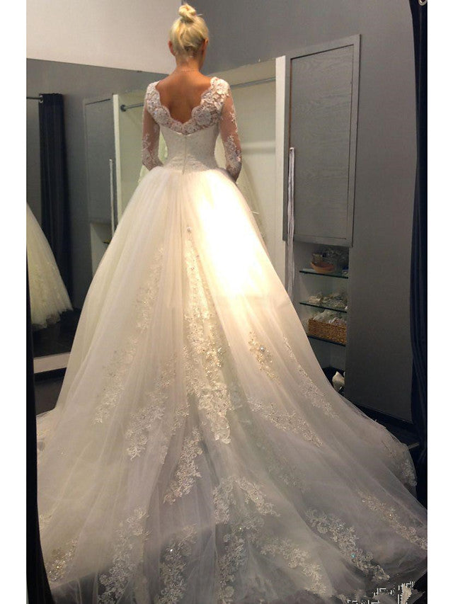 Vestidos de novia de tul con encaje, cola de corte y escote joya en forma de A y manga larga