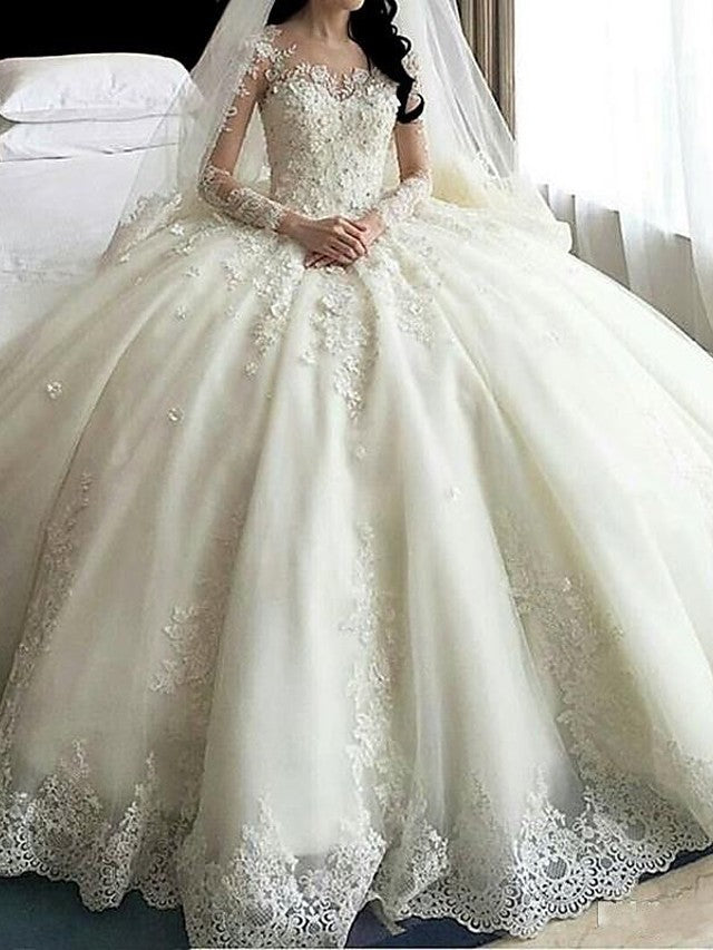 Vestidos de novia de organza con cola de corte y escote redondo y manga larga en A