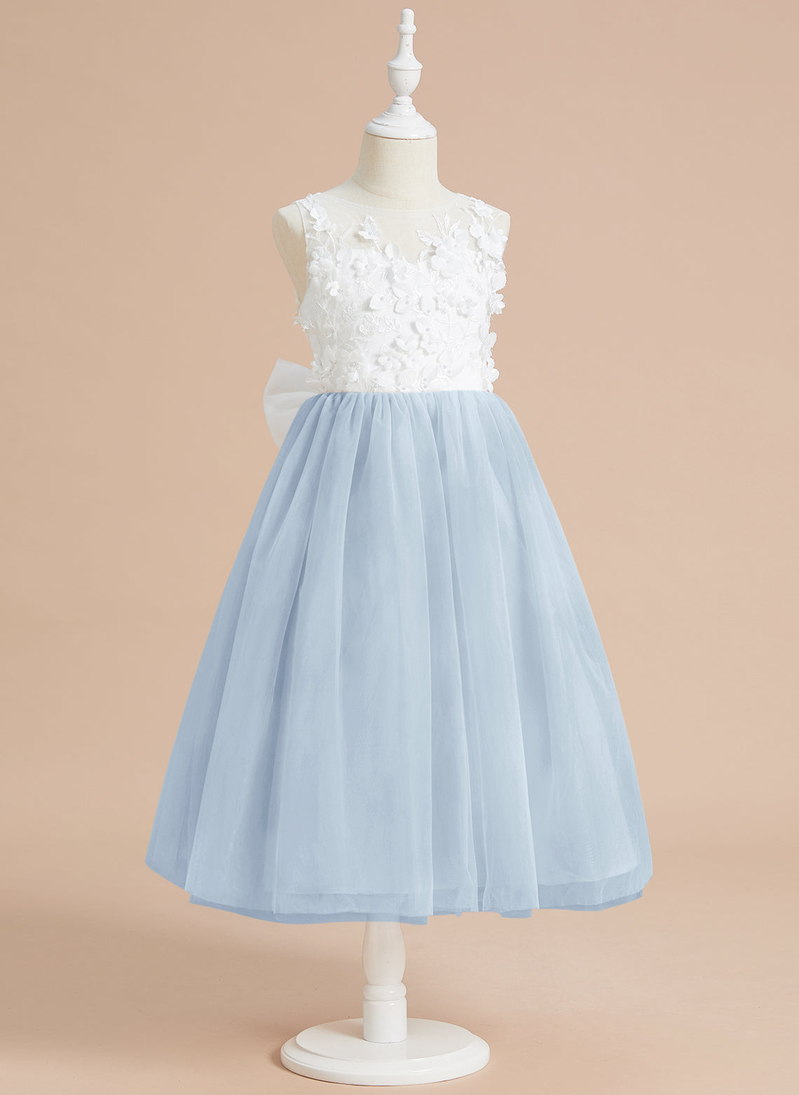 Vestido largo hasta la rodilla con encaje floral y lazo grande