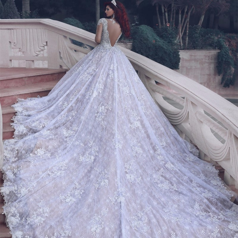 Atemberaubendes wunderschönes muslimisches Brautkleid aus transparenter Spitze mit Kristallperlen