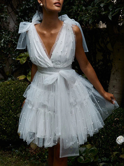 TARUXY Solid Mesh Splice Bow Mini Dress For Women Pearl Sleeveless Sexy Plunge V Neck Solid Elegant Party Evening Dress Female