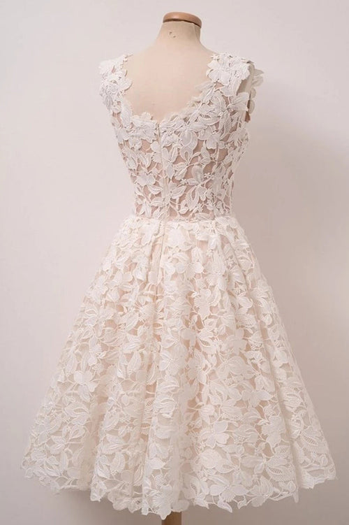 Elegantes vestidos de fiesta cortos de encaje con corte en A