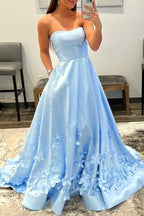Vestido de fiesta azul claro sin tirantes, corte A, con flores 3D
