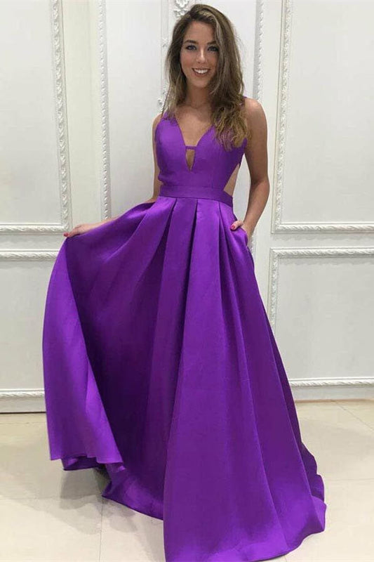 Vestido de fiesta sin mangas, con escote en V y espalda descubierta, corte A y bolsillos prácticos