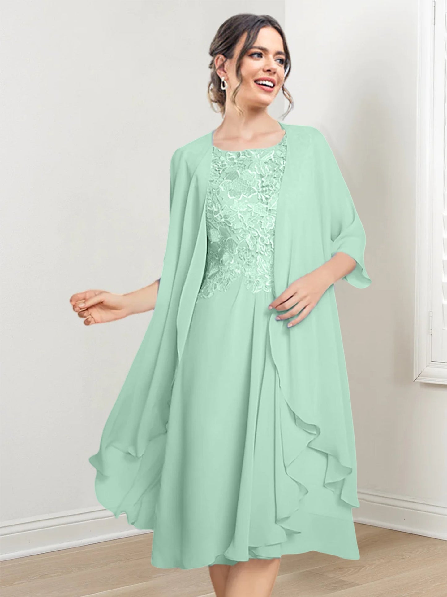 Vestidos de madre de la novia de corte A/princesa con escote redondo y largo hasta la rodilla