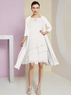 Vestidos de madre de la novia de corte A/princesa con escote joya y largo hasta la rodilla