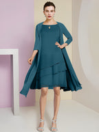 Vestidos de madre de la novia de corte A/princesa con escote joya y largo hasta la rodilla