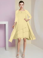 Vestidos de madre de la novia de corte A/princesa con escote joya y largo hasta la rodilla