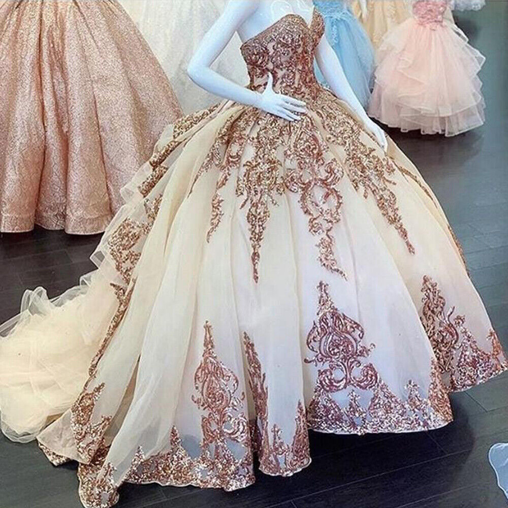 Vestidos de quinceañera en oro rosa con apliques de lentejuelas y escote corazón Y401
