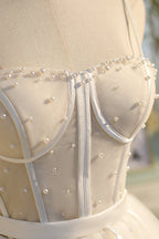 Vestidos de fiesta de princesa con tirantes finos color champán y tul con cuentas