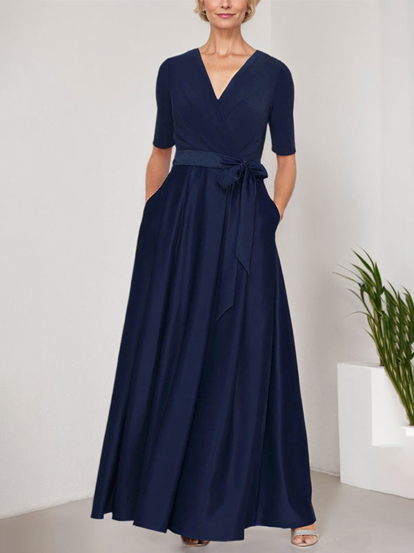 Vestido de gala con escote cruzado, falda de satén y corpiño de jersey