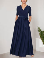Vestido de gala con escote cruzado, falda de satén y corpiño de jersey