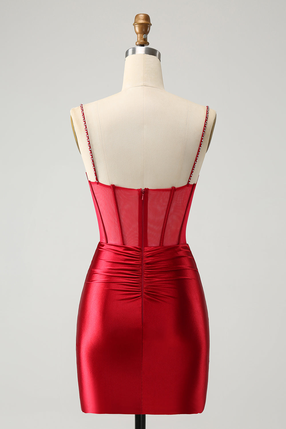 Vestido corto elegante de fiesta con corsé plisado y ajustado en color fucsia con cuentas