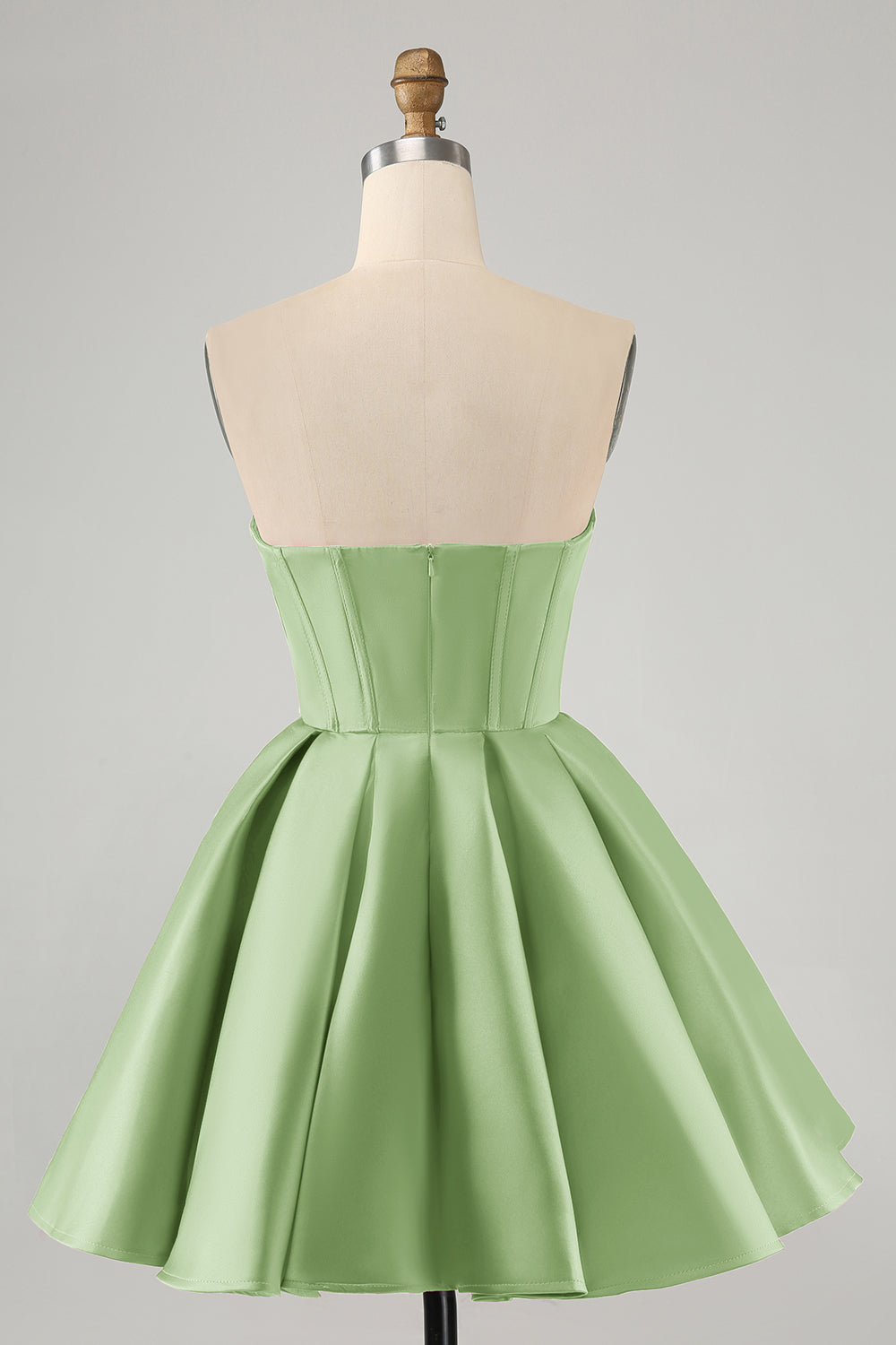 Hermoso vestido de fiesta corto fucsia con escote en forma de A y corsé con cuentas