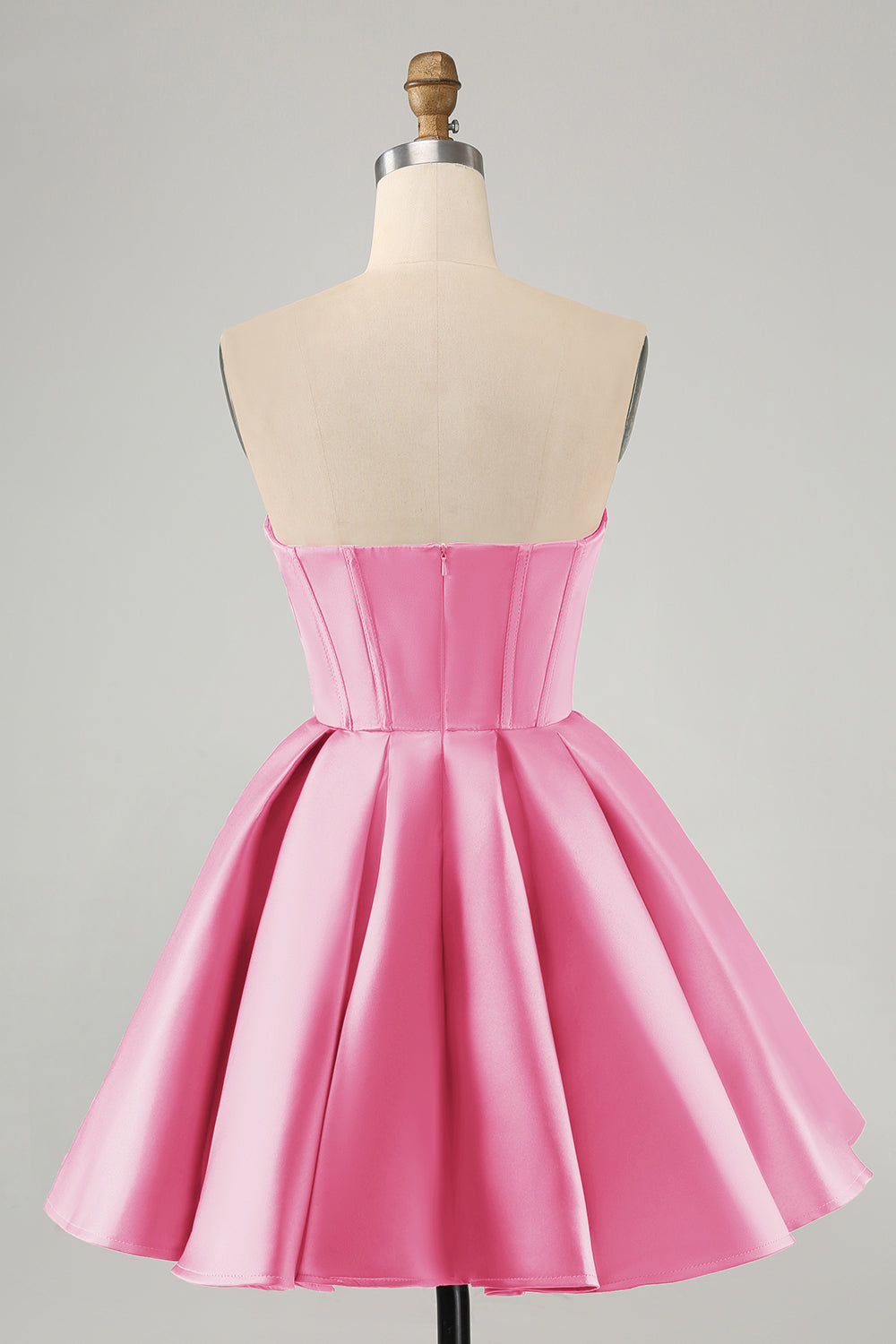 Hermoso vestido de fiesta corto fucsia con escote en forma de A y corsé con cuentas