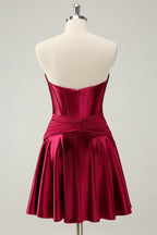 Hermoso vestido de fiesta fucsia con escote en forma de A, corsé cruzado y volantes