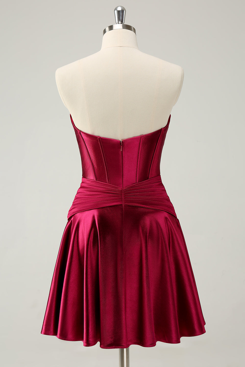 Hermoso vestido de fiesta fucsia con escote en forma de A, corsé cruzado y volantes