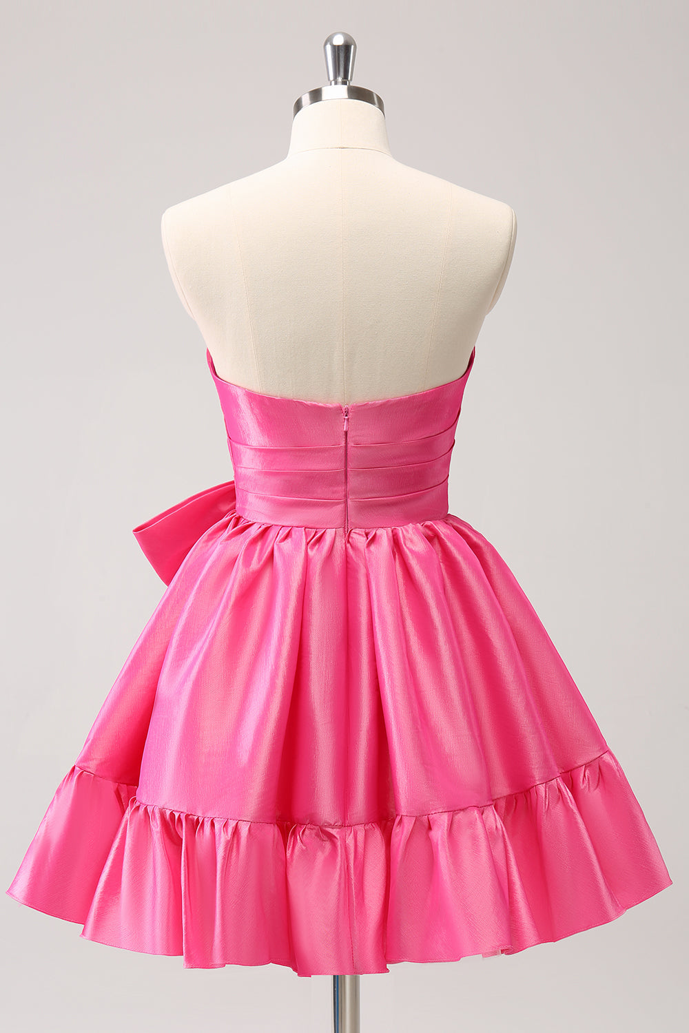 Bonito vestido de fiesta corto plisado sin tirantes, de corte A, color rosa intenso, con lazo